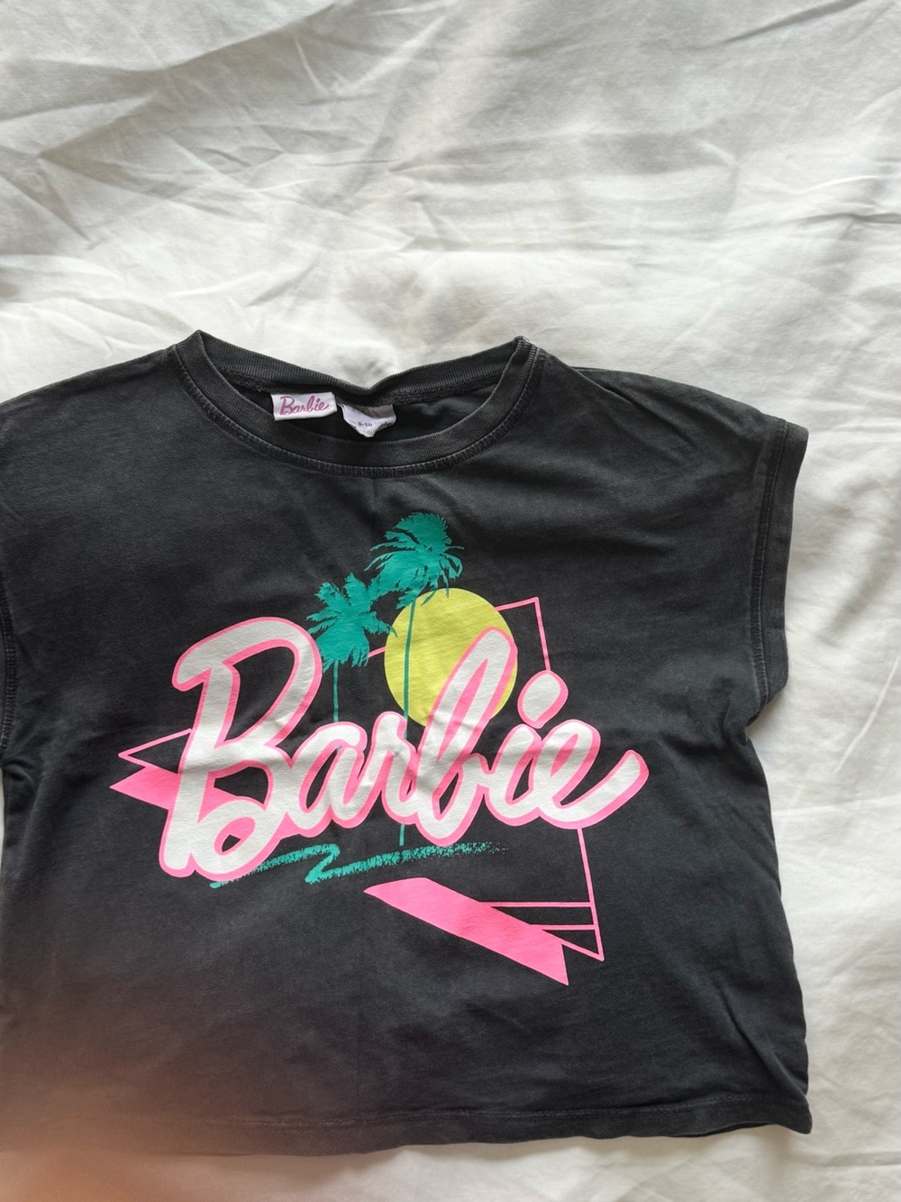 Barbie Black Crop Tee with Pink Script, Teal Palms & Yellow Sun